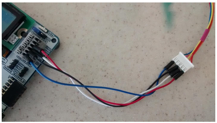 Figure A.6.  Stepper motor connector to Basys MX3 connection. The stepper motor pink wire is not connected.